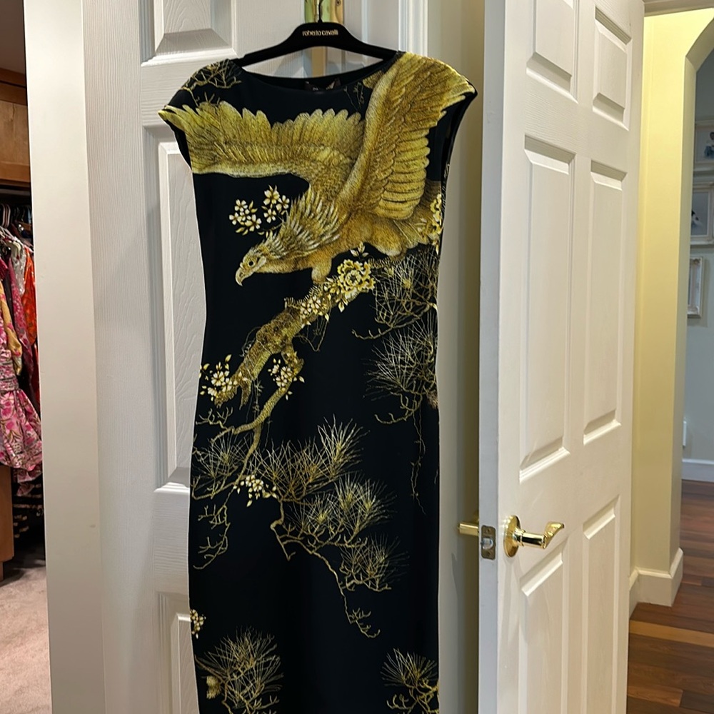 Roberto Cavalli size42 black with yellow print. Midi length 41”